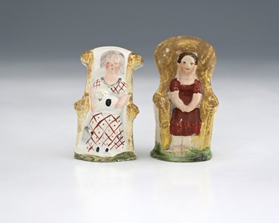 Lot 812 - Two Staffordshire armchair figures, early 19th...