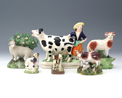 Lot 815 - A collection of Staffordshire figures of farm...