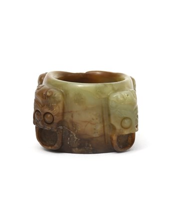 Lot 463 - A Chinese jade archers ring, carved with four...