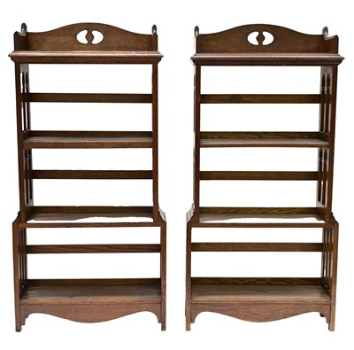 Lot 445 - A pair of oak bookcases, rectangular four tier...
