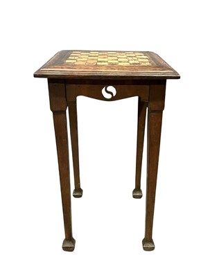 Lot 898 - An Arts and Crafts oak chess table, with...