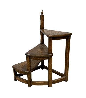 Lot 976 - A set of oak library steps, three spiral steps...