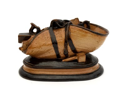 Lot 53 - A Doulton Lambeth stoneware model of a...