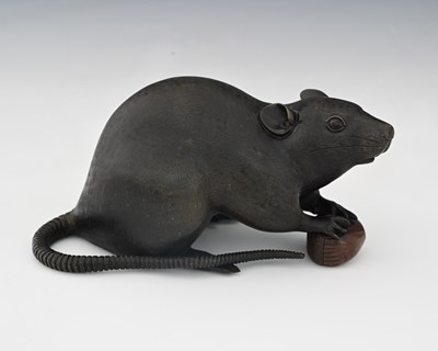 Lot 484 - A Japanese bronze figure of a rat, Meiji,...