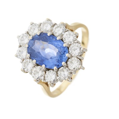 Lot 74 - An 18ct gold sapphire and diamond cluster ring