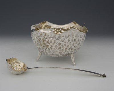 Lot 97 - An Aesthetic Movement silver and parcel gilt...