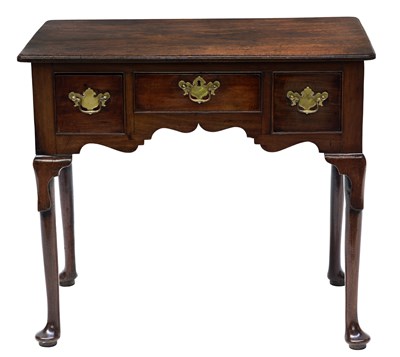 Lot 319 - A George III mahogany lowboy, circa 1780,...