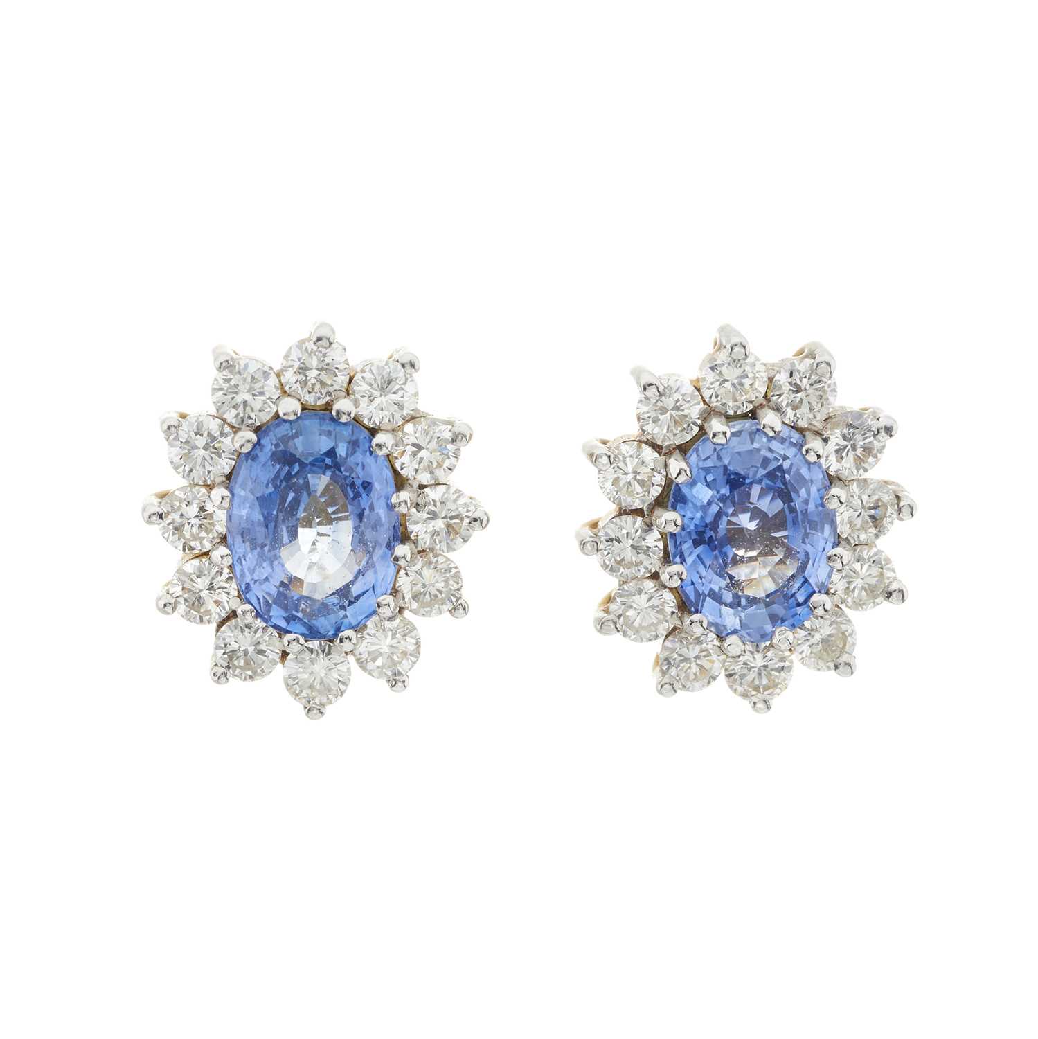 Lot 47 - A pair of 18ct gold sapphire and diamond cluster stud earrings