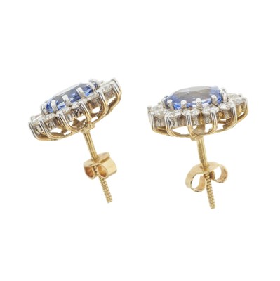 Lot 47 - A pair of 18ct gold sapphire and diamond cluster stud earrings