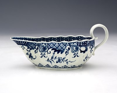 Lot 842 - Worcester, a blue and white low sauce boat,...