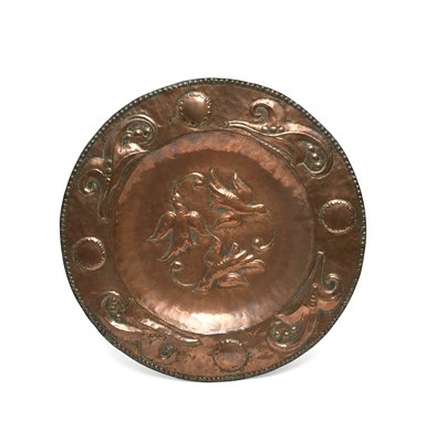 Lot 475 - A John Pearson repousse copper wall charger,...