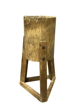 Lot 876 - A butchers block formed from a log bolted to a...