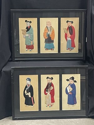Lot 847 - A pair of Chinese three-panel collages or silk...