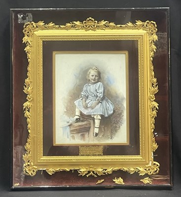 Lot 838 - A hand tinted photographic portrait on...