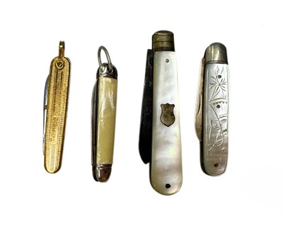Lot 669 - Four pen knives, with silver blades