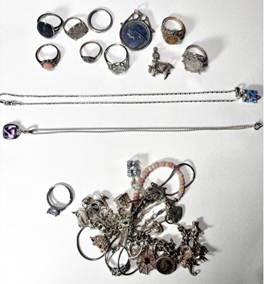 Lot 692 - A selection of silver jewellery, to include a charm bracelet