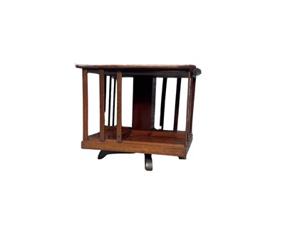 Lot 893 - A small early 20th century revolving tabletop...