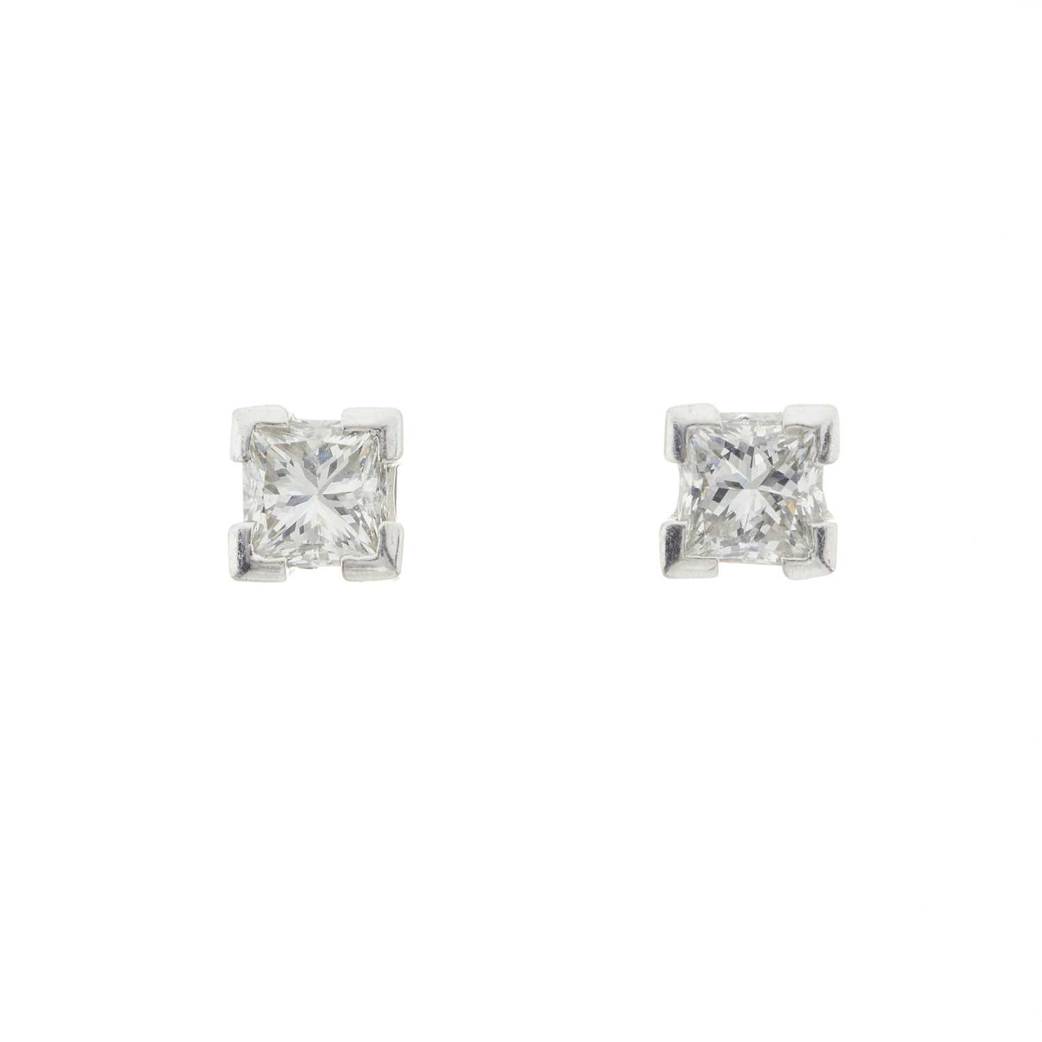 Lot 49 - A pair of 18ct gold diamond single-stone stud earrings