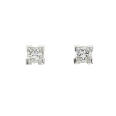 Lot 49 - A pair of 18ct gold diamond single-stone stud earrings