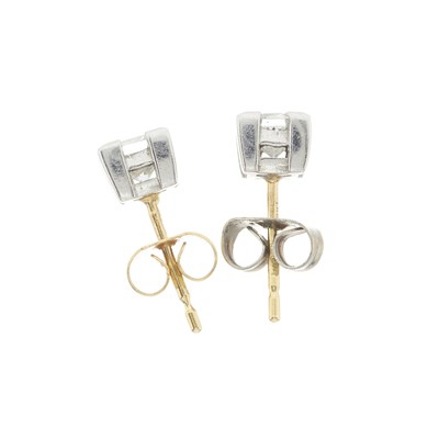 Lot 49 - A pair of 18ct gold diamond single-stone stud earrings