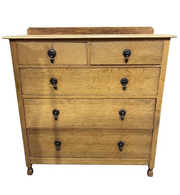 Lot 917 - An oak quarter sawn two over three chest of...