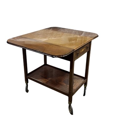 Lot 935 - An early 20th century mahogany drop leaf...