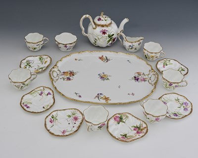 Lot 620 - A late Victorian Aesthetic Movement bone china...
