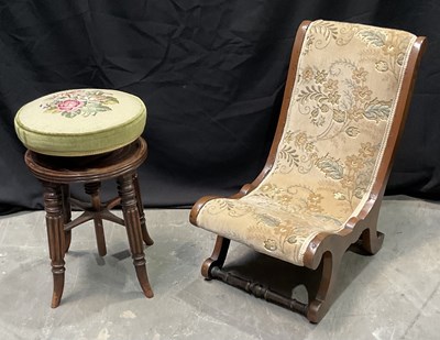 Lot 930 - A mahogany William IV revolving piano stool...