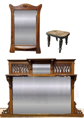 Lot 891 - An Arts and Crafts wall mirror with central...