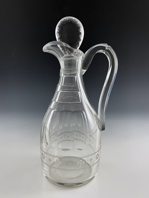 Lot 476 - A George III cut glass claret jug and stopper