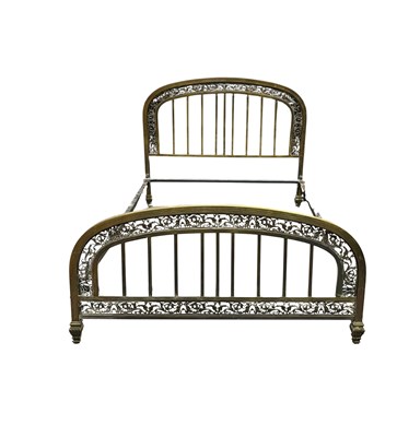 Lot 999 - An Edwardian brass headed bed, height 113cm,...
