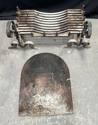 Lot 970 - A cast iron fire basket with dogs of swan neck...