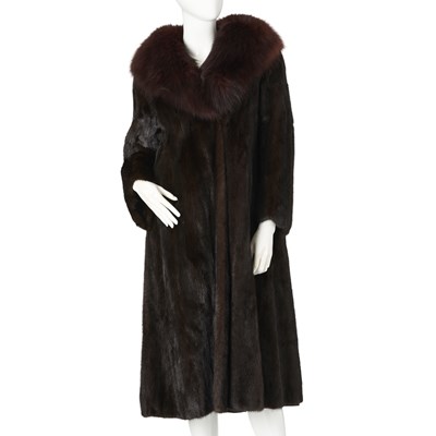Lot 526 - A dark ranch mink coat with fox fur collar.