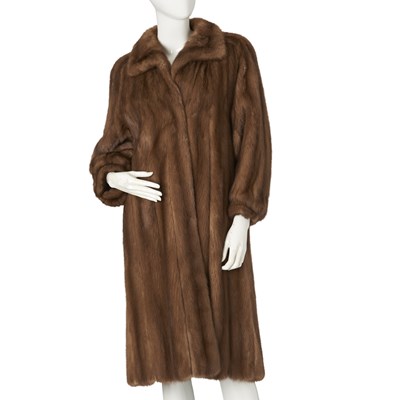 Lot 527 - A knee-length pastel mink coat.