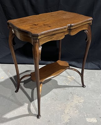 Lot 884 - Edwardian mahogany games table of serpentine...