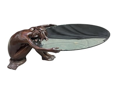 Lot 877 - A heavy bronze-effect and glass sculptural...