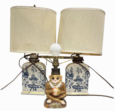 Lot 76 - A late 19th century porcelain lamp formed as a...