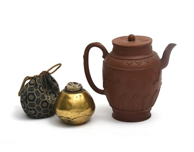 Lot 348 - A Yixing pottery teapot and cover, modelled in...