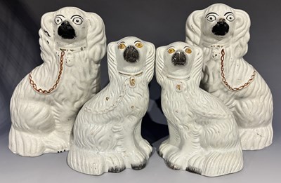 Lot 255 - A pair of Staffordshire spaniels or fireplace...