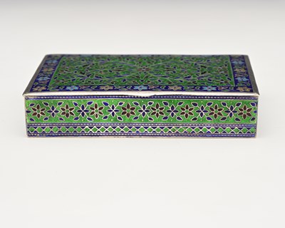 Lot 7 - An Eastern silver-coloured metal and enamel...