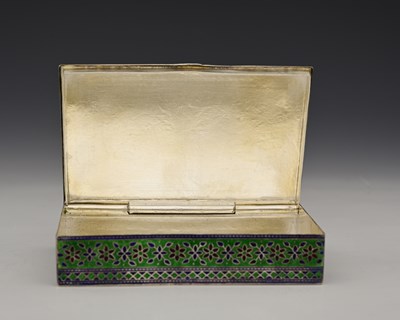 Lot 7 - An Eastern silver-coloured metal and enamel...
