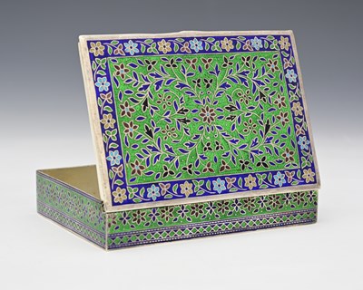 Lot 7 - An Eastern silver-coloured metal and enamel...