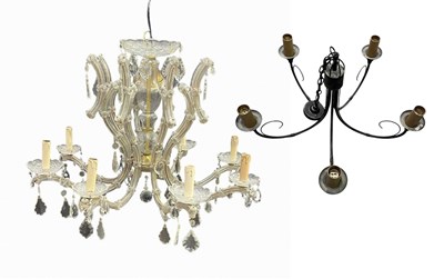 Lot 989 - A 20th century glass 8 light chandelier,...