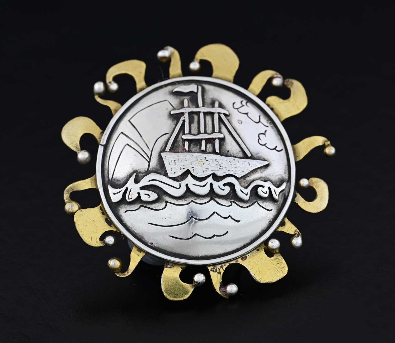 Lot 34 - A Scandinavian silver and gilt metal target...