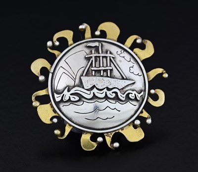 Lot 34 - A Scandinavian silver and gilt metal target...