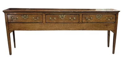 Lot 873 - A George III country oak standing dresser,...