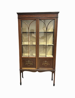 Lot 975 - An Edwardian mahogany strung vitrine, circa...