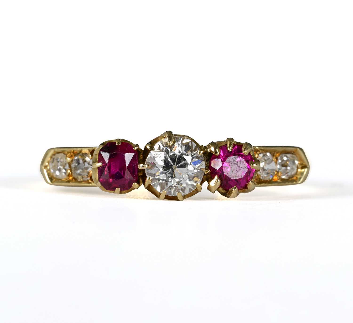 Lot 8 - An 18ct gold diamond and ruby dress ring