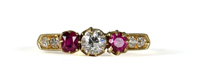 Lot 8 - An 18ct gold diamond and ruby dress ring