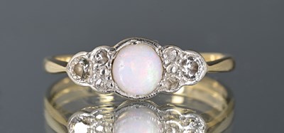 Lot 15 - An 18ct gold opal and diamond dress ring